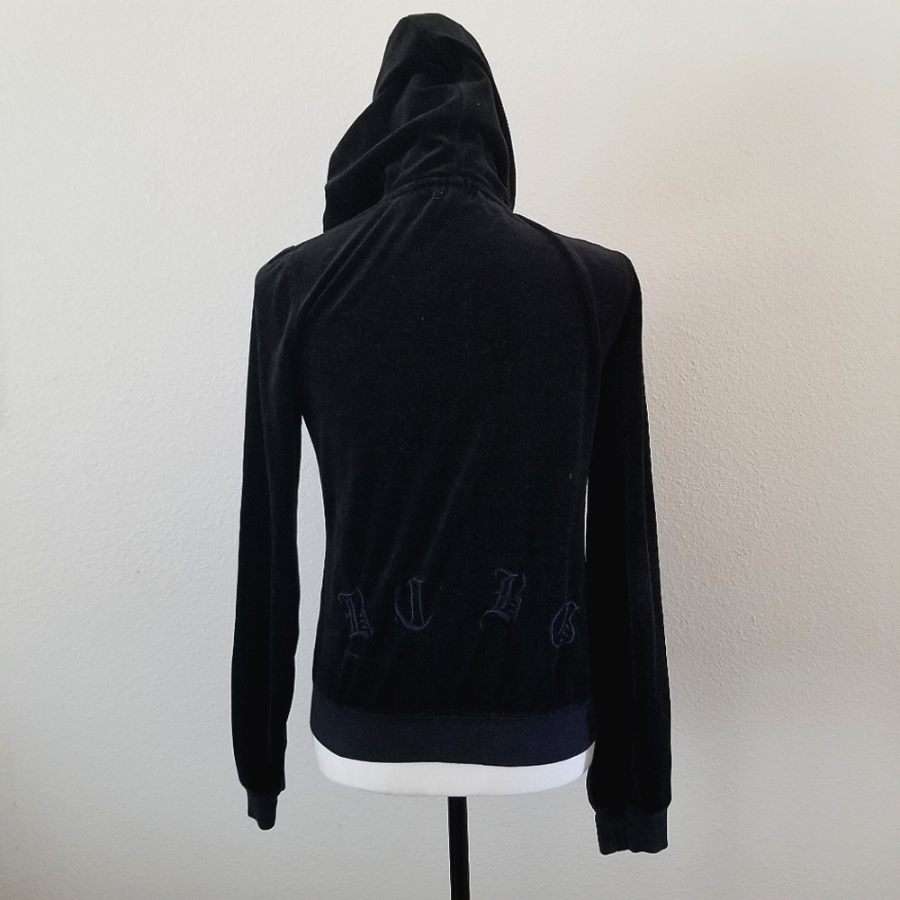 BCBG Maxazria velour hooded sweater in a size LARG